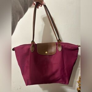 Longchamp tote in deep berry with brown leather trim